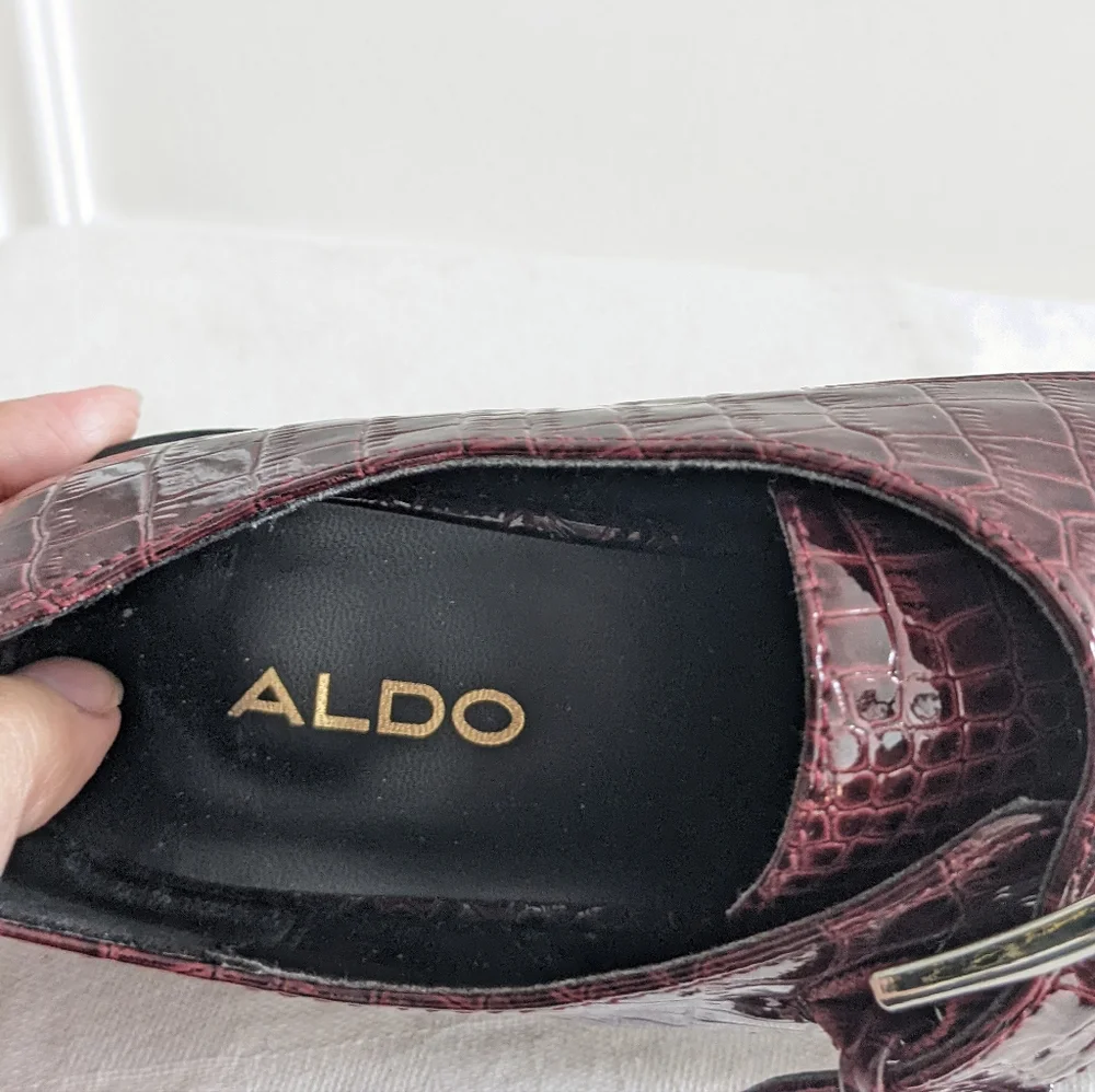 Patent leather loafers by Aldo